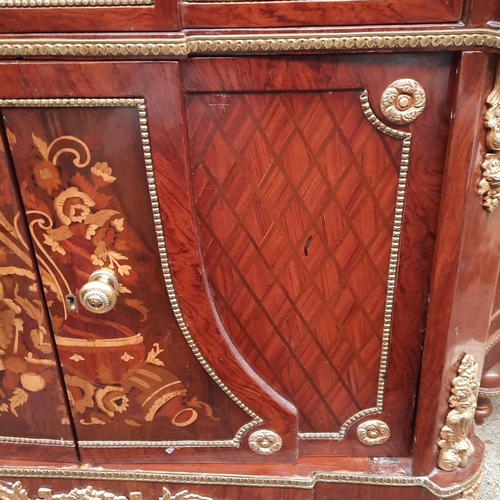 1673 - Star Lot : Serpentine mahogany sideboard with parquetry panels and floral marquetry doors, three fri... 