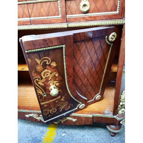 1673 - Star Lot : Serpentine mahogany sideboard with parquetry panels and floral marquetry doors, three fri... 