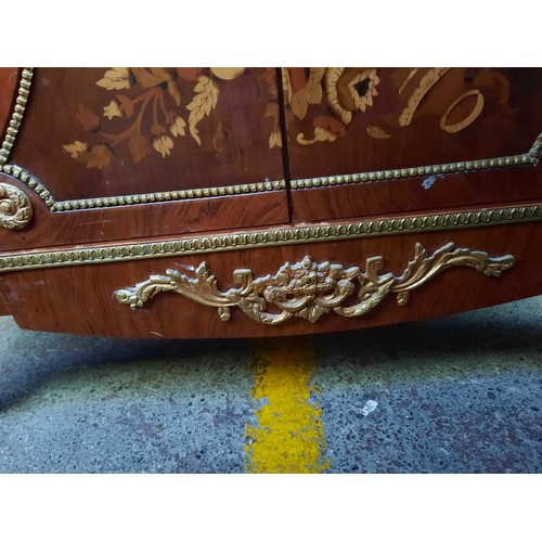 1673 - Star Lot : Serpentine mahogany sideboard with parquetry panels and floral marquetry doors, three fri... 