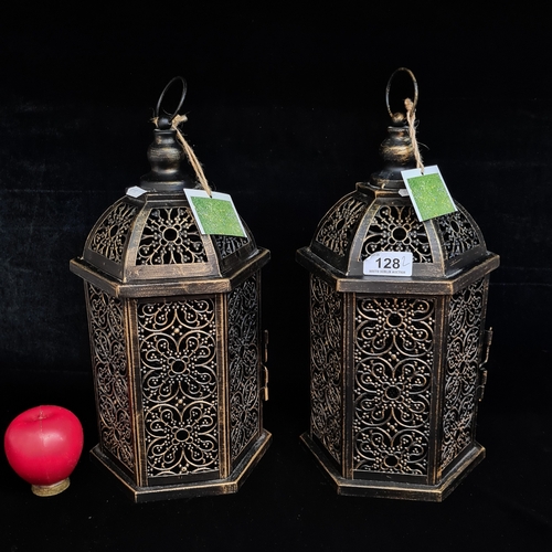 128 - Two brand new metal garden lantern holders / birdcages with pierced design throughout and hexagonal ... 