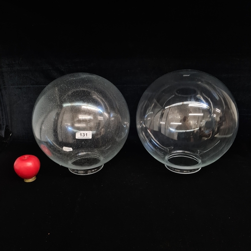 131 - Two wonderful vintage large glass display globe light shades. .
Please note, the image of the modell... 