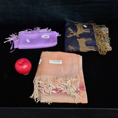 134 - Three beautiful Pashmina natural fibre scarves including one 100% Cashmere example, a Pashmina Silk ... 