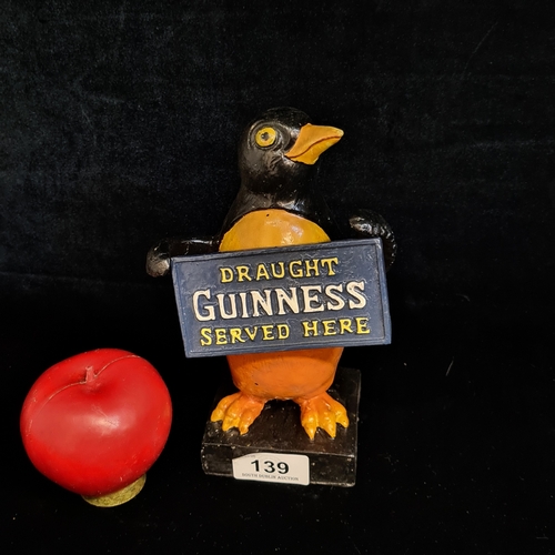 139 - A charming advertising Penguin sculpture for Guinness sat atop a square plinth base.
Please note, th... 