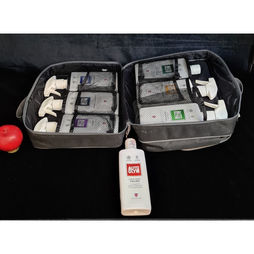 143 - A new Volkswagen Auto Glym car cleaning accessory kit comprised of custom wheel cleaner, super resin... 