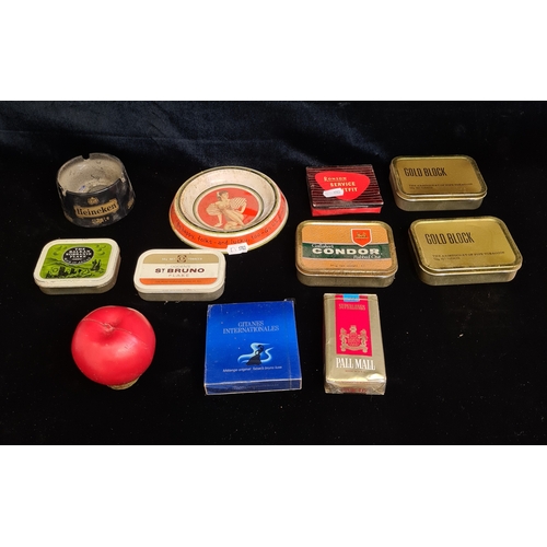 147 - A vintage mixed lot of new old stock Tobacco and Tobacco related items. Includes two ashtrays, full ... 