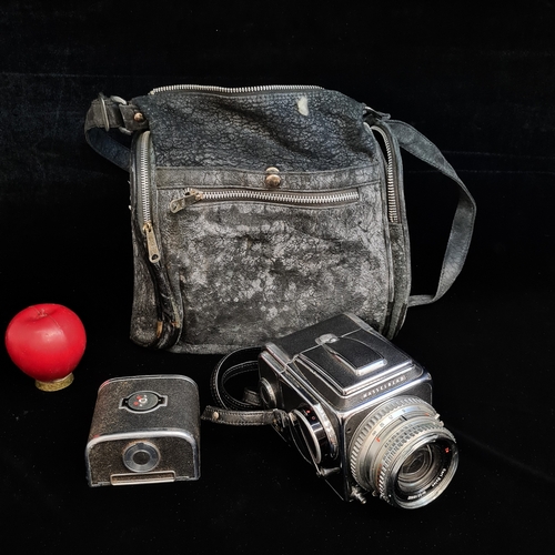 159 - Super Star Lot: A 'Hassleblad 500c medium format' film camera fitted with a 'Carl Zeiss 1:2.8/ 80 mm... 
