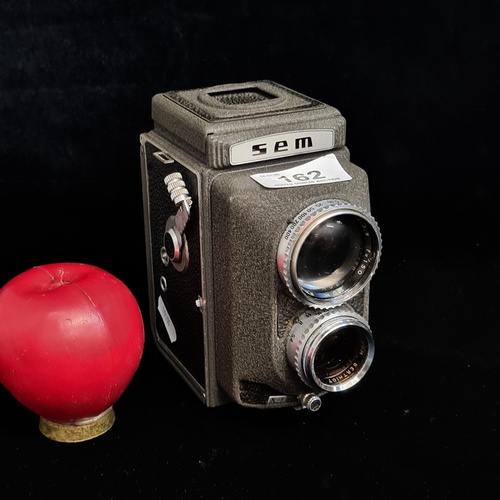 162 - Star Lot : An 'SEM Semflex TLR' studio medium format 120 film camera. RRP:€599 
Short History of the... 