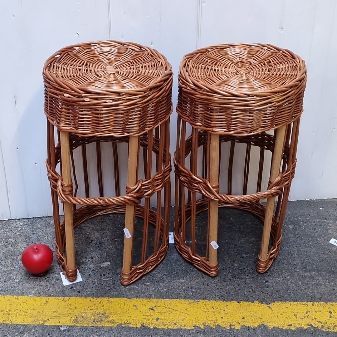 Pair of circular stools with woven rattan tops and bamboo uprights ...