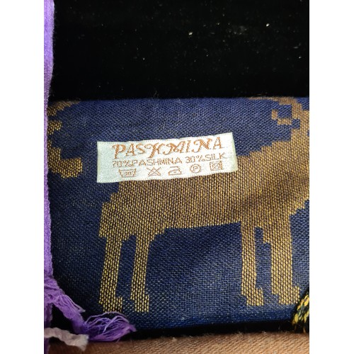134 - Three beautiful Pashmina natural fibre scarves including one 100% Cashmere example, a Pashmina Silk ... 