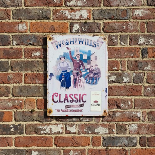124 - A printed metal sign advertising WD & Howills Classic Mild Cigars.
Please note, the image of the mod... 