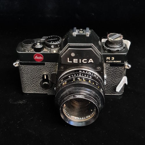 152 - Star lot : A 'Leitz Leica R3 Elektronic 35mm SLR' film camera. Fitted with a 'SUMMICRON R 1:2/50' le... 