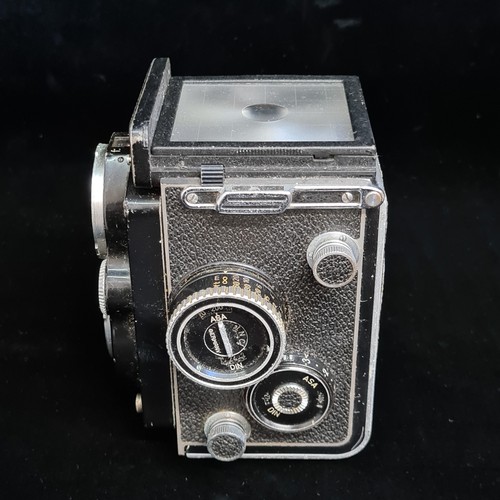 151 - Star Lot : A 'Rolleiflex 3.5F Model 3 twin lens reflex' medium format film camera. Features a 'Carl ... 