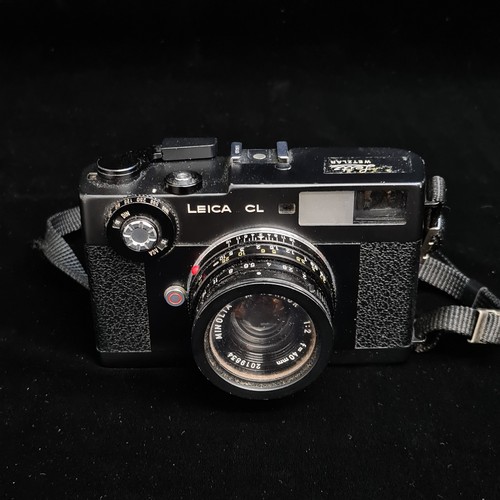 153 - Star Lot: A 'Leitz Wetzlar Leica CL 1970's 35mm' film camera. Fitted with 'Minolta M-Rokkor 1:2 f=40... 