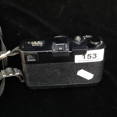 153 - Star Lot: A 'Leitz Wetzlar Leica CL 1970's 35mm' film camera. Fitted with 'Minolta M-Rokkor 1:2 f=40... 
