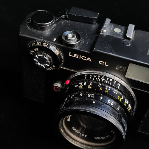 153 - Star Lot: A 'Leitz Wetzlar Leica CL 1970's 35mm' film camera. Fitted with 'Minolta M-Rokkor 1:2 f=40... 