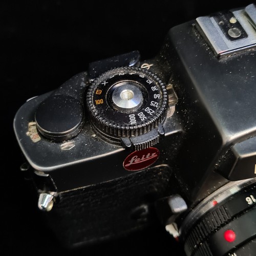 154 - Star Lot: A Leitz Leica R4 35mm film SLR camera fitted with a Summicron R 1:2/50 lens. RRP €859.