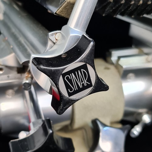 155 - Star Lot : A vintage 'Sinar Norma System C. Koch 4x5 inch' mono rail camera. Includes a ' Maiya-Seik... 