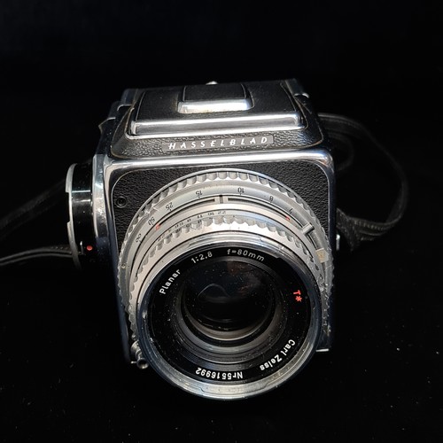159 - Super Star Lot: A 'Hassleblad 500c medium format' film camera fitted with a 'Carl Zeiss 1:2.8/ 80 mm... 