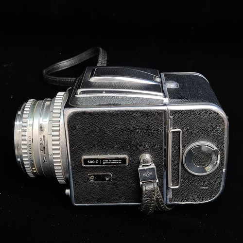 159 - Super Star Lot: A 'Hassleblad 500c medium format' film camera fitted with a 'Carl Zeiss 1:2.8/ 80 mm... 
