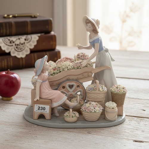 230 - Star Lot : A very large large limited edition porcelain Spanish made Nadal figure depicting a mother... 