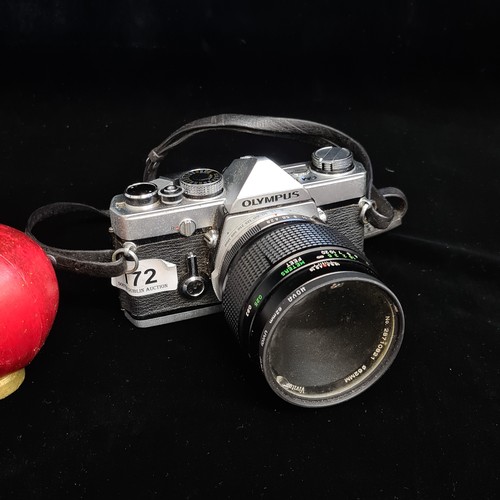 172 - An Olympus OM-1 1970's 35mm film SLR camera. Fitted with Vivitar 1:2.8/50mm auto macro lens. Appear ... 