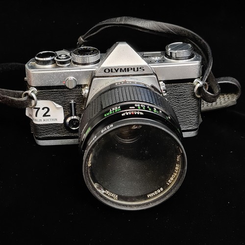 172 - An Olympus OM-1 1970's 35mm film SLR camera. Fitted with Vivitar 1:2.8/50mm auto macro lens. Appear ... 