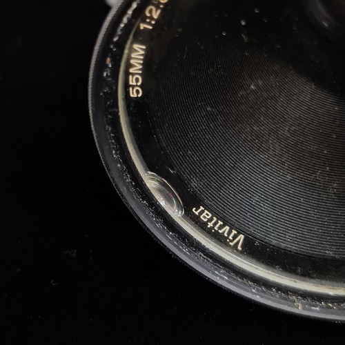 172 - An Olympus OM-1 1970's 35mm film SLR camera. Fitted with Vivitar 1:2.8/50mm auto macro lens. Appear ... 