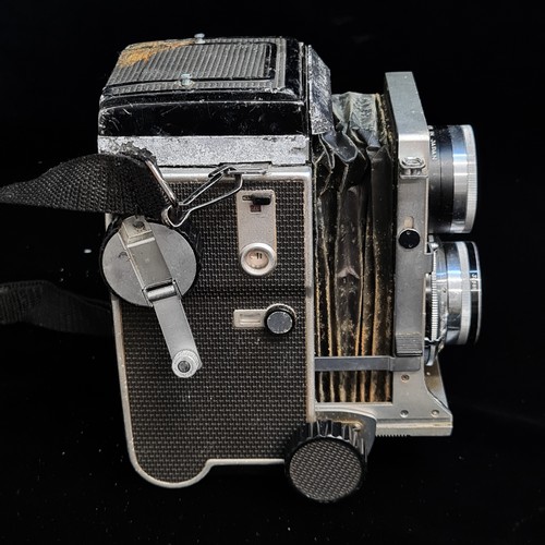 178 - Star Lot : A vintage 1968 Mamiya C220 TLR medium format 120 film camera. Held in a vintage leather c... 