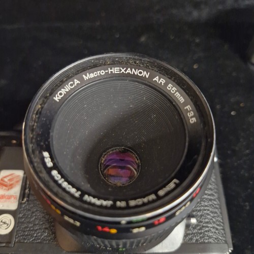 209 - Star Lot: Three vintage film cameras including a Nikon FM €321, a Pentax asahi SP 1000 €153
, and a ... 