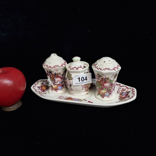 104 - Four Mason's Ironstone pieces including a Salt and Pepper Shakers and a lidded pot sat atop a matchi... 