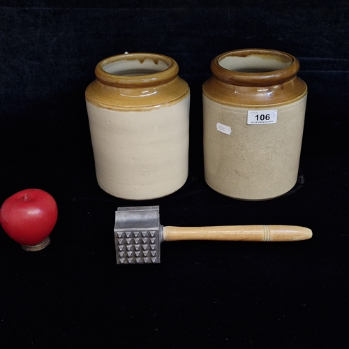 106 - Two vintage antique stoneware jars. Both in good good condition. Alongside a wooden handled meat mal... 