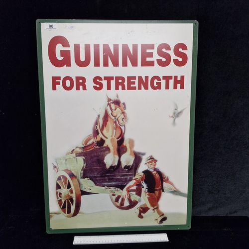 88 - A large printed metal wall sign reading 'Guinness For Strength'. MM: 50cm x 70cm/ Please note, the i... 