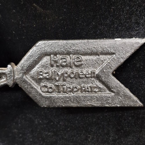 168 - Star Lot : A vintage large wall mounted cast metal garden weather vane depicting a farrier working o... 