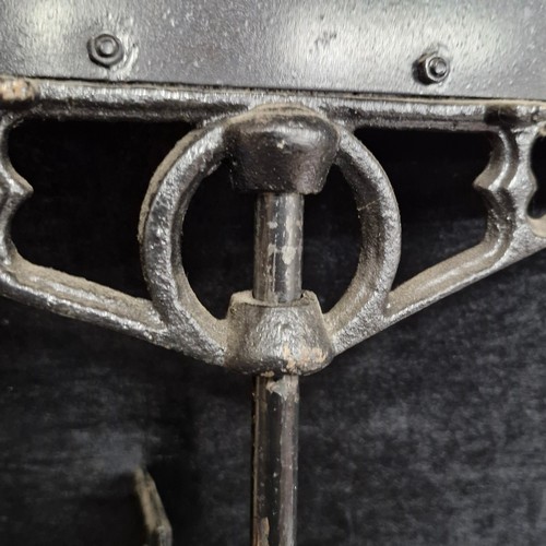 168 - Star Lot : A vintage large wall mounted cast metal garden weather vane depicting a farrier working o... 