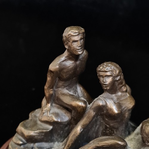 93 - A Genesis Fine Arts Children of Lir Sculpture sat atop a ovular wooden base with a felted protective... 