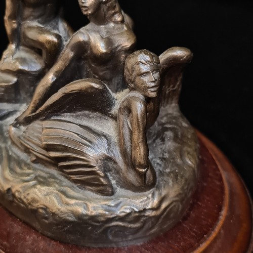 93 - A Genesis Fine Arts Children of Lir Sculpture sat atop a ovular wooden base with a felted protective... 