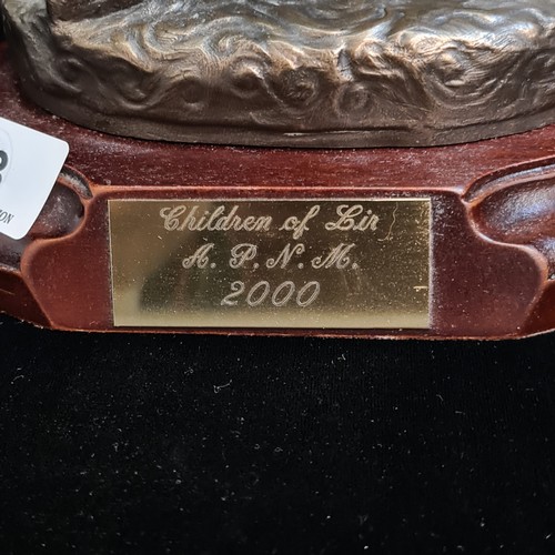 93 - A Genesis Fine Arts Children of Lir Sculpture sat atop a ovular wooden base with a felted protective... 