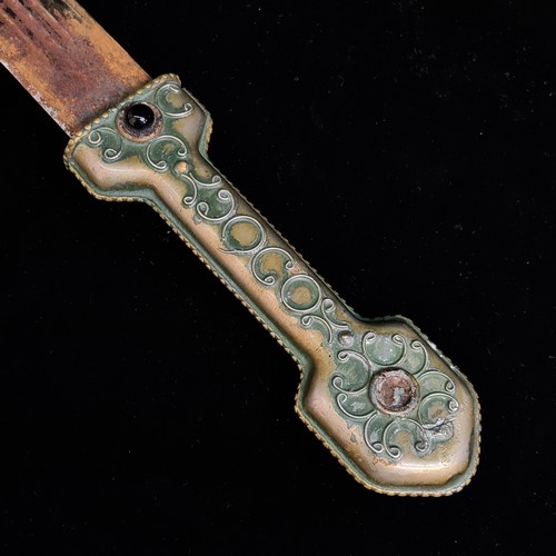 112 - A large antique dagger / sword with Brass handle. Features ornate design throughout with original br... 