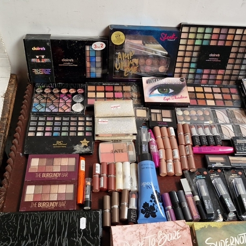 Large collection of assorted make-up and accessories, including ...