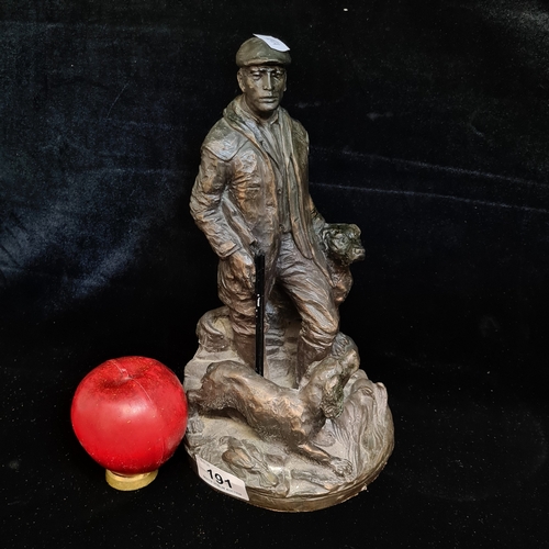191 - A Genesis Fine Arts Ireland Game Keeper with dogs sculpture. Cold cast resin with bronze finish. Lov... 