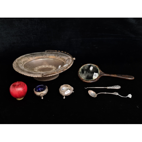 207 - An assorted lot of five antique and vintage items comprising of a sterling silver boot hook hallmark... 