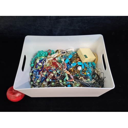 217 - A large container comprising of assorted quality costume jewellery, including some vintage example. ... 