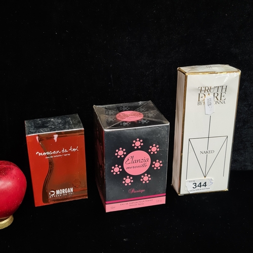 344 - Three perfumes comprising of Truth or Dare by Madonna Naked 75ml rrp €109, Elanzia Merveille Prestig... 