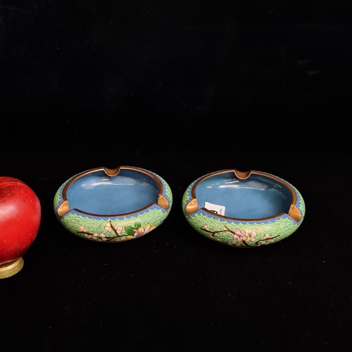 199 - A pair of pretty Chinese Cloisonne enameled ashtrays. In good condition. In good order.