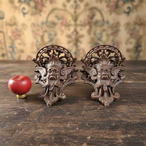 240 - A good pair of heavy cast metal decorative wall sconces. Please note, the image of the modelled item... 