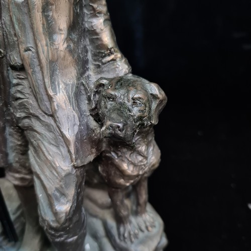 191 - A Genesis Fine Arts Ireland Game Keeper with dogs sculpture. Cold cast resin with bronze finish. Lov... 