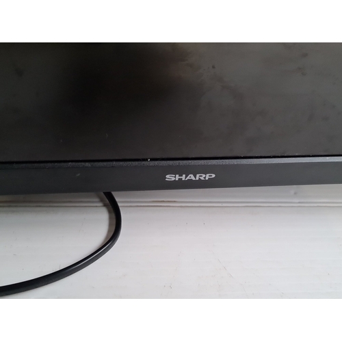 Sharp Aquos 32in LCD colour television, model 32BB3I, with matching ...