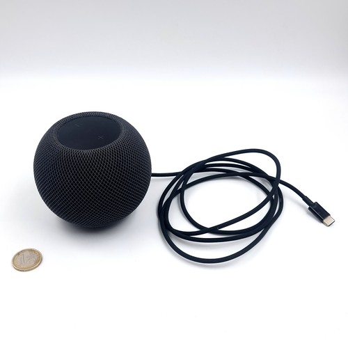 An Apple HomePod mini speaker model. A2374. Apple's compact smart