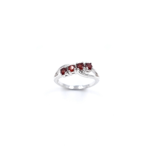 22 - A pretty Sterling Silver 925 four Garnet gemstone ring. Size - L, Weight - 2.48 grams. Please note, ... 