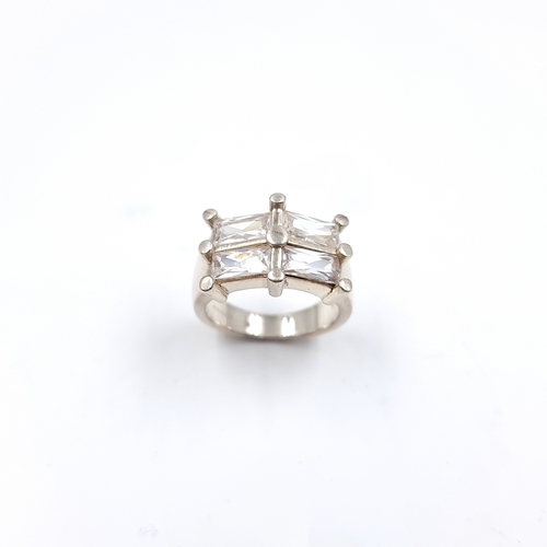 24 - A heavy hallmarked Silver gemstone statement ring. Size - P, Weight - 9.4 grams. Please note, the im... 